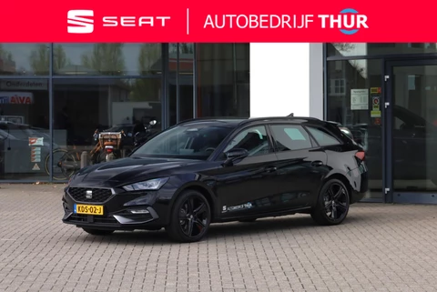 SEAT Leon Sportstourer 1.5 TSI e-Hybrid FR Business Dodehoekdetectie (side assist), achteruitrijcamera (rear view), parkeersensoren voor en achter (pdc), keyless start & entry, Apple Carplay & Android Auto, elektrische achterklep met sensorsturing, verwarmbare voorstoelen, verwarmbaar multifunctioneel lederen stuurwiel, adaptieve cruise control (acc), DAB+, draadloze telefoonlader, elektrisch verstel-, verwarm- en inklapbare buitenspiegels etc.