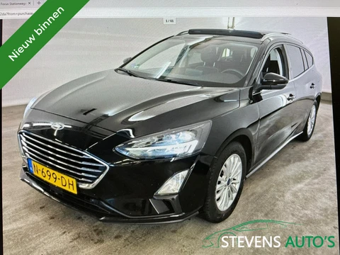 Ford Focus Wagon 1.0 EBH Tit. XBns PANODAK / STOELV&STUUR VERW. / CAMERA / TREKHAAK