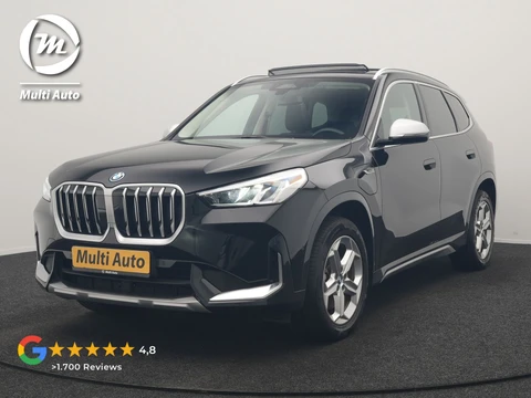 BMW X1 xDrive30e X Line PHEV 326pk Dealer O.H. | Trekhaak Af Fabriek | Panodak | Camera | Harman / Kardon | Lederen Voorstoelen Memory & Verwarmd | Sfeerverlichting | Apple Carplay | Navigatie | DAB | Cruise Control | Plug In Hybrid |
