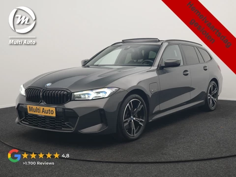BMW 3 Serie Touring 330e M Sport FACELIFT PHEV 293pk Dealer O.H. | Dravitgray | Trekhaak Af Fabriek | Panodak | Head Up | Camera | Lederen Sportstoelen Verwarmd | Sfeerverlichting | Apple Carplay | Keyless | Blis | Cruise Control | Navigatie | DAB | Plug In Hybrid |