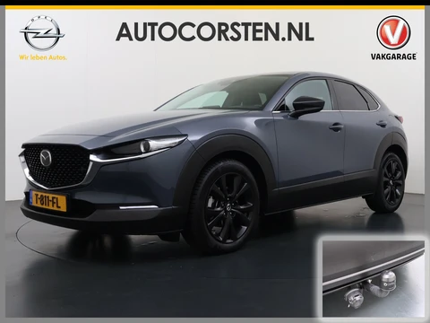 Mazda CX-30 2.0I 187PK MHEV AUT. Trekhaak Adap.Cruise Homura Camera Stoelverwarming Ecc Head-Up Display Navi Apple Carplay/Android Auto e-SkyActiv-X M Homura Dodehoekdetectie Keyless Elek.Achterklep Privacy Glas Lmv Isofix DAB Bluetooth Regen-Lichtsensor 1.300KG Trekgewicht 1e Eigenaar Orig. NLse auto