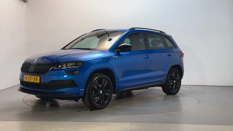 Skoda Karoq 1.5 TSI 150pk ACT Sportline Business Camera Trekhaak Sfeerverlichting Stoelverwarming Adaptive Cruise LED
