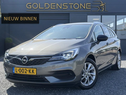 Opel Astra Sports Tourer 1.2 Business Elegance ✓1e Eigenaar✓110pk✓Carplay✓Camera✓Navi✓Clima✓Cruise✓Halfleder✓Comfortstoel✓Pdc V+A✓6 Bak✓Dealer Onderhouden✓Keyless✓Lm velgen✓N.A.P✓Apk tot 06-2027