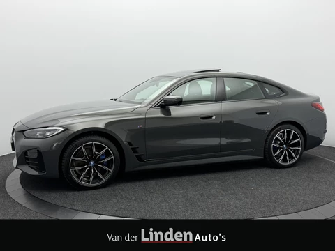 BMW i4 eDrive40 84 kWh M Sport Pro SOH 97,4% | Wegklapbare Trekhaak | 360° Camera | Harman/Kardon | Schuif\Kanteldak
