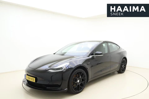 Tesla Model 3 Standard RWD Plus 60 kWh | Trekhaak | Panoramadak | SOH 88,4% | Elektrische best.stoel | Lichtmetalen velgen | Lederenkleding