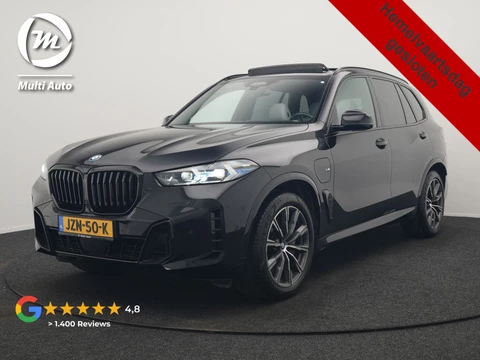 BMW X5 xDrive50e M Sport PHEV 490pk Dealer O.H. | Panodak | Luchtvering | Adaptive Cruise | Head Up | 360 Camera | Harman / Kardon | Lederen Sportstoelen Memory & Verwarmd | Sfeerverlichting | Apple Carplay | Keyless | Blis | 20"L.M | Plug