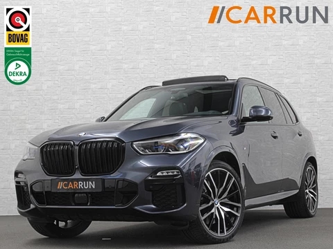 BMW X5 xDrive40i M-Sport | Panorama | 360 Camera | ACC | Laser-LED | Head-Up | Harman-Kardon | Trekhaak | Keyless-Entry | 22 inch | Memory | Leder | Carplay | Dealer Onderhouden | ISO-Glas | Sfeerverlichting | Draadloos Laden |
