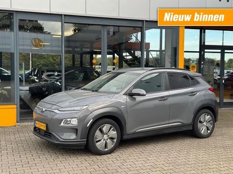 Hyundai Kona 64 kWh Fashion 100% SOH - Head Up - dodeh detec - Krell audio - trekhaak - all season