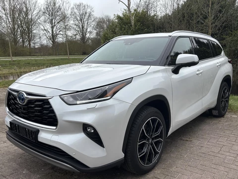 Toyota Highlander 2.5 AWD Hybrid Premium | 7p | Panoramadak | 360 graden camera | Platinum Pearl White | Adaptieve cruisecontrol | JBL audio | Head up Display | Stoelverwarming | Achterbank verwarmd