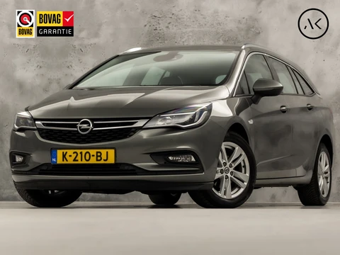 Opel Astra Sports Tourer 1.4 Turbo Innovation Sport 150Pk Automaat (APPLE CARPLAY, NAVIGATIE, CAMERA, STUUR/STOELVERWARMING, SPORTSTOELEN, ADAPTIVE CRUISE, LM VELGEN, NIEUWSTAAT)