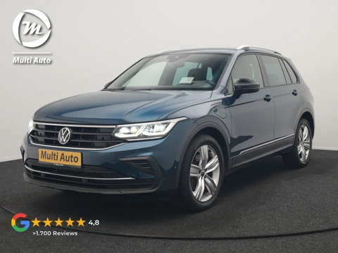 Volkswagen Tiguan 1.4 TSI eHybrid Active PHEV 245pk Dealer O.H. | Trekhaak Af Fabriek | Adaptive Cruise | Head Up | IQ Light | Keyless | Blis | Sportstoelen & Stuur Verwarmd | Sfeerverlichting | Apple Carplay | Navigate | DAB | 19"L.M | Plug In Hybrid |