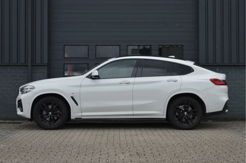 BMW X4 xDrive20i High Executive | M-PAKKET | PANO | TREKHAAK | HUD | HIFI | CAM |