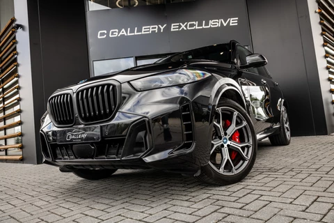 BMW X5 xDrive50e - M Sport Pro | Skylounge | B&W | Kuipstoelen | Luchtvering