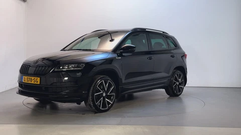 Skoda Karoq 1.5 TSI DSG ACT Sportline Business Panoramadak Trekhaak Adaptive Cruise Sfeerverlichting