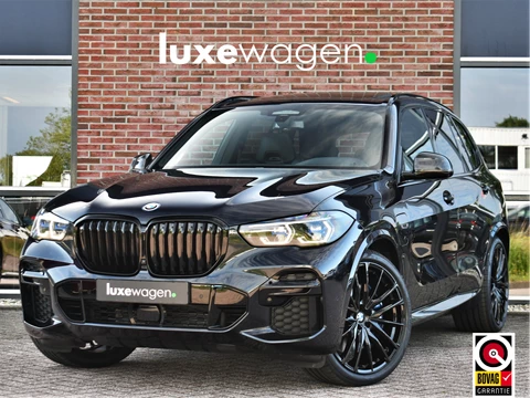 BMW X5 xDrive45e M-Sport SkyLounge M-zetels 4WS ACC Trekh 360 2xTV Carbon HUD