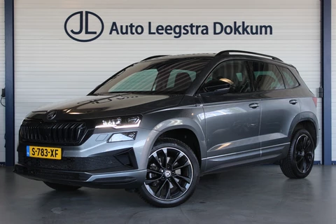 Škoda Karoq 1.5 TSI ACT Sportline Business Facelift | Trekhaak | Camera | Keyless | Adapt. Cruise | Stoel/Stuurverw. | Virtual Cockpit | Carplay | 18" LMV | PDC V+A