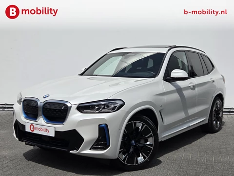 BMW iX3 High Executive M-Sport 80 kWh SOH 98% 'Mineral-Weiss' Trekhaak Panoramdak Harman/Kardon | Adaptive Cruise Control | Elek. Stoelen | Head-Up | DAB