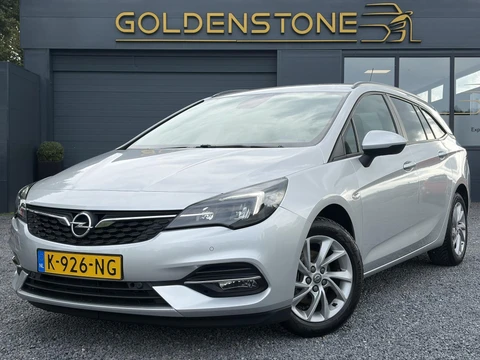 Opel Astra Sports Tourer 1.2 Business Executive ✓1e Eigenaar✓146pk✓Camera✓Trekhaak✓Carplay✓Airco✓Cruise✓Pdc V+A✓Lm velgen✓Comfortstoelen✓6 Bak✓N.A.P✓Apk tot 11-2028