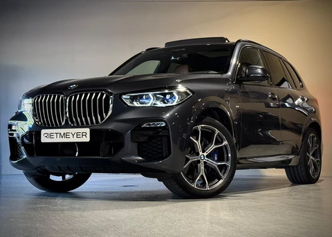 BMW X5 xDrive45e High Executive |Pano |Achterasbesturing |Luchtvering |HUD |Sky Lounge |H&K |360° |Verkoel./Verwarm. stoelen&bekerhouders |Sfeer