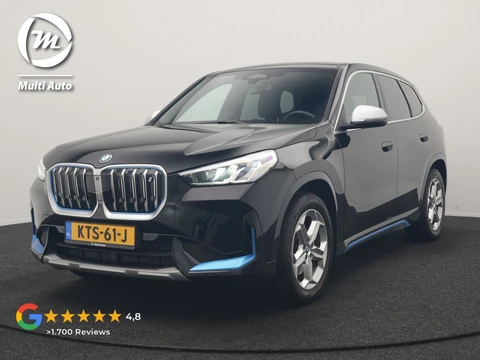 BMW iX1 xDrive30 X Line 67 kWh 313pk Dealer O.H. | Trekhaak Af Fabriek | Adaptive Cruise | Lederen Sportstoelen Massage & Verwarmd | Camera | Adaptief M-onderstel | Blis | Sfeerverlichting | Apple Carplay | Navigatie | DAB |