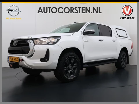 Toyota Hilux 2.4 D-4D 4WD AUT-6 Double Cab Professional Lier Canopy Hardtop (Huif) Trekhaak Navi* via Apple Carplay Android Auto Ecc Camera Adap.Cruise Control Lane Assist Inbouw Kasten Bluetooth AWD EURO6 400Nm *3.500kg Trekvermogen* 1e Eigenaar Dealeronderhouden Origineel Nederlandse Auto