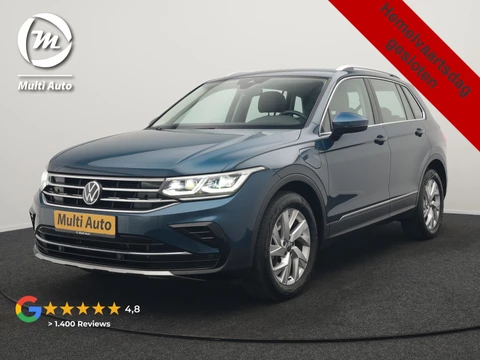 Volkswagen Tiguan 1.4 TSI eHybrid Elegance PHEV 245pk Dealer O.H. | Trekhaak Af Fabriek | Adaptive Cruise | IQ Light | Camera | Lederen Comfortzetels Memory & Verwarmd | Sfeerverlichting | Apple Carplay | Stuur Verwarmd | Navigatie | DAB | Plug In Hybrid |
