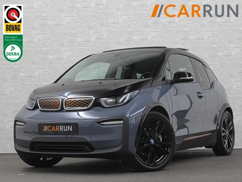 BMW i3 Unique Forever Edition 120Ah Sport-Pakket | Navi-Prof | Warmtepomp | 94% SOH | Snel Laden | Panorama | Camera | LED | Leder | 20'' | Stoelverwarming |