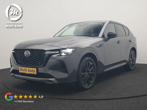 Mazda CX-60 2.5 e-SkyActiv PHEV Homura 327pk Dealer O.H. | SOH 89,9% | Trekhaak Af Fabriek | Adaptive Cruise | Head Up | Camera | Lederen Sportstoelen & Stuur Verwarmd | BLIS | Keyless | Apple Carplay | Navigatie | DAB | Plug In Hybrid |
