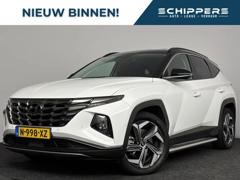 Hyundai Tucson 1.6 T-GDI HEV Premium | 1.650kg trekgewicht | Hybrid | Two-Tone