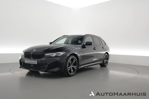 BMW 3 Serie Touring 320e M Sport | Facelift | Shadow Line | Curved display | Adapt. Cruise | Nav + CarPlay | Elek. Klep | Sfeerverlichting | LED | Stoelverw. | PDC