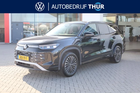 Volkswagen Tayron 1.5 eHybrid Elegance wegklapbare trekhaak leder / alcantara area view elektrische achterklep spiegel pakket navigatie IQ Matrix comfort telefoon laders 2 x travel assist ACC keys less acces & entry 18" LMV napoli privacy glas chroom pakket travel assist draadloos carplay