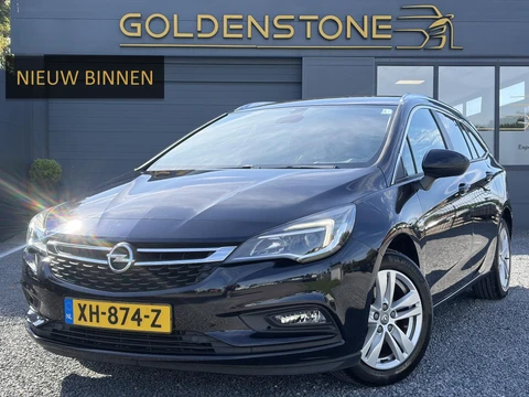 Opel Astra Sports Tourer 1.4 Turbo Online Edition ✓150pk✓2e Eigenaar✓Camera✓Carplay✓Navi✓Pdc V+A✓Stoelverw✓Stuurverw✓Clima✓Cruise✓Lm velgen✓6 Bak✓Comfortstoelen✓Dealer Onderhouden✓N.A.P✓Bj 12-2018✓Apk tot 01-2027