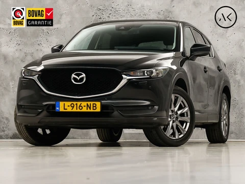 Mazda CX-5 2.0 SkyActiv-G 165 Luxury Sport 165Pk Automaat (APPLE CARPLAY, GROOT NAVI, STUUR/STOELVERWARMING, GETINT GLAS, SPORTSTOELEN, KEYLESS, TREKHAAK, LANE ASSIST, LED KOPLAMPEN, NIEUWSTAAT)