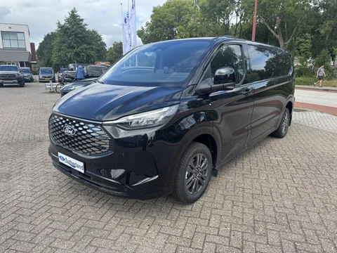 Ford E-Transit Custom 340 L2H1 Limited 71 kWh | SCI | 218pk | Laadvloer bescherming | 12-weg verstel- en verwarmbare AGR bestuurders- en passagiersstoel Laadvloer bescherming,12-weg verstel- en verwarmbare AGR bestuurders- en passagiersstoel | Trekhaakvoorbereiding | 17 inch lichtmetalen velgen (Carbonised Grey) | Driver Assistent Pack Ultimate | AGM accu | BEV 3-fase oplaadkabel (mode 3, 32A, 10m)