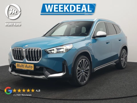 BMW X1 xDrive30e X Line PHEV 327pk Dealer O.H. | 20" Individual | Camera | Lederen Sportstoelen & Stuur Verwarmd | Sfeerverlichting | Apple Carplay | Blis | Keyless | Navigatie | DAB | Cruise Control | 20"L.M | Plug In Hybrid |