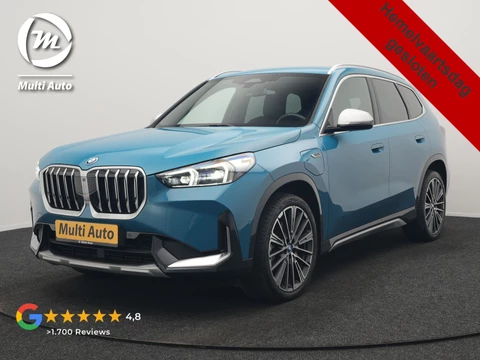 BMW X1 xDrive30e X Line PHEV 327pk Dealer O.H. | 20" Individual | Camera | Lederen Sportstoelen & Stuur Verwarmd | Sfeerverlichting | Apple Carplay | Blis | Keyless | Navigatie | DAB | Cruise Control | 20"L.M | Plug In Hybrid |