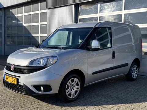Fiat Doblò Cargo 1.3 MJ L1H1 SX 90pk Btw en Bpm vrij Airco Cruise controle Navigatie Tussenschot Parkeerhulp achter 1e eigenaar Ex overheid Euro 5 Marge
