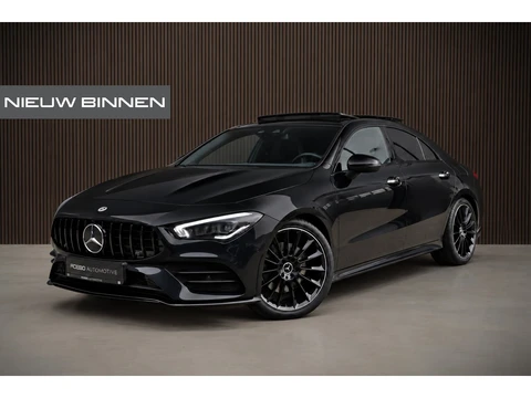 Mercedes-Benz CLA 180 Business Solution AMG | Panoramadak | Camera | Dodehoekdetectie | Keyless | Midline Sound | Stoelverwarming | Ambiance Verlichting | Navigatie | LED | Cruise Control |