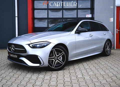 Mercedes C-klasse Estate 300 e AMG Line 313PK | Pano | Luchtvering | Air-Balance | MBUX | Burmester | Night Pakket | Ambient+ | Laser Led | Massage | Stoelventilatie & Verwarming  | Stuurwielverwarming  | Head-Up | Trekhaak | Cruise | Camera | Keyless