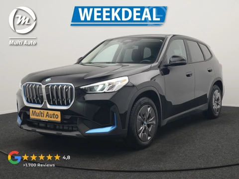 BMW iX1 xDrive30 67 kWh 313pk Dealer O.H. | Adaptief M Onderstel | Camera | Cruise Control | Stoelverwarming | Widescreen Navi | Park Assist | Apple Carplay | Navigatie | DAB | Standkachel |