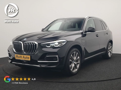 BMW X5 xDrive45e X Line PHEV 395pk Dealer O.H. | Luchtvering | Camera | Adaptief Onderstel | Lederen Sportstoelen Memory | Hifi Audio | Apple Carplay | Sfeerverlichting | Navigatie | DAB | Plug In Hybrid |